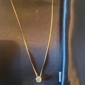 14 K gold with cubic zirconia solitaire